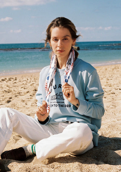 COURAGE SWEATSHIRT IN SKY BLUE WITH NAVY PRINT